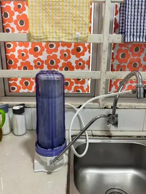 a blue blender sitting on top of a sink at AYAAN BLOOM BUDGET HOMESTAY FREE WiFi & Netflix in Cameron Highlands