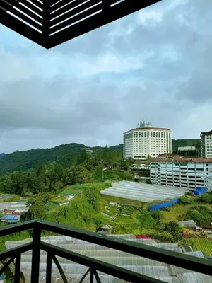 a view from the balcony of a building at Sunrise & KeaFarmview at Hilltop NOVA CoolSummer in Tanah Rata