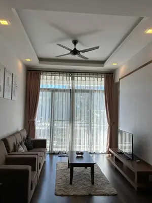 a living room with a couch and a flat screen tv at Nova Highlands Hilltop Retreat Cameron Highlands in Brinchang