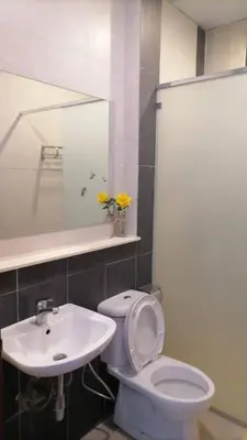 a bathroom with a white toilet and a sink at Nova Highlands Hilltop Retreat Cameron Highlands in Brinchang