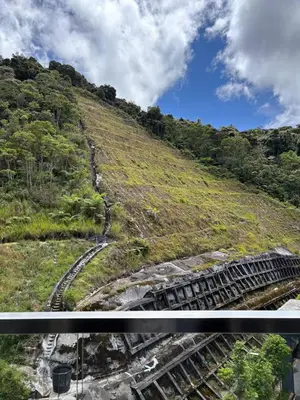 a set of train tracks on a hill with trees at Ella Residence Homestay 2 in Brinchang