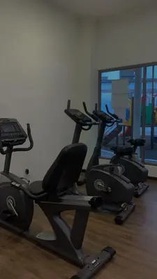 a gym with three exercise bikes in a room at Ella Residence Homestay 2 in Brinchang