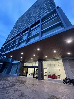 a building with a motorcycle parked outside of it at ICC Luxury Suites Ipoh City Centre By Landmark in Ipoh
