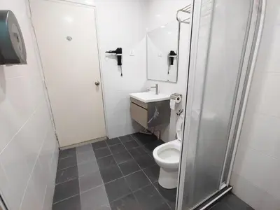 a small bathroom with a toilet and a sink at D'Ocean Marina Laguna Resort by Manhattan Group in Lumut
