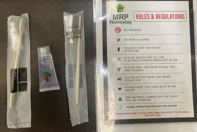 a package of toothbrushes in a box with a receipt at Budget Homestay Lahat in Ipoh