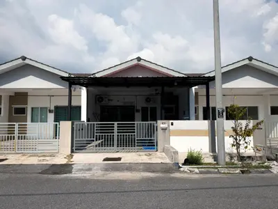 a house with a gate in front of it at NDD Homestay in Sitiawan