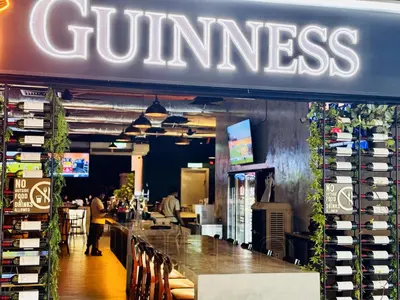 a gourmet store with a bar in front of it at Georgetown near Gurney and Straits Quay Seaview with Netflix and Washer Dryer in George Town