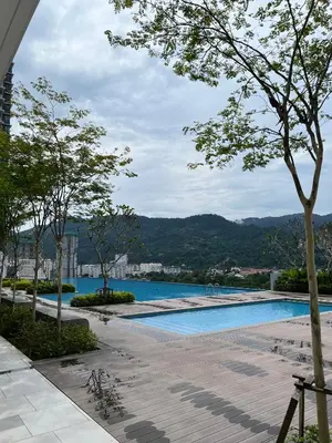 a swimming pool with a view of a city at Sunshine Residence in Ayer Itam