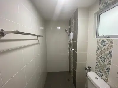 a bathroom with a shower and a toilet at Anderson Residency Ipoh Wifi Pool Islam in Ipoh