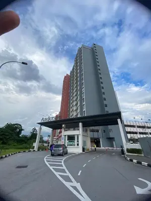 a building with a car parked in a parking lot at Anderson Residency Ipoh Wifi Pool Islam in Ipoh