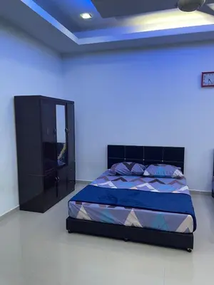 a bedroom with a bed with a blue ceiling at 6 Rooms Budget 3 Tingkat USM Gelugor Georgetown in Gelugor