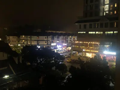 a view of a city at night with lights at Rayyan'Homestay PARKVIEW in Tanah Rata