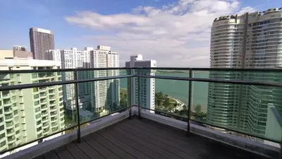 a balcony with a view of a city with buildings at Mansion One 279 in George Town