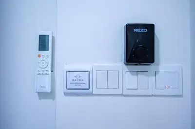 a nintendo wii game system with a remote control at The Sun #3BR #11 FamilyStay #BayanLepas in Bayan Lepas