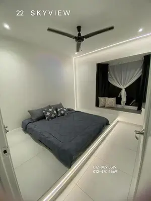 a bed in a room with a window at 22 Skyview in Bukit Mertajam