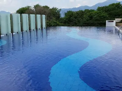 a pool of water with blue water at Ipoh town The Majestic Rumi 3R2B 8 paxs in Ipoh