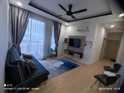 a living room with a couch and a tv at 3 Bedroom Apartment YuCasa Sg Nibong Penang in Bayan Lepas