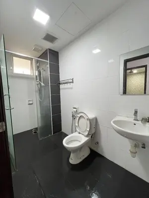 a bathroom with a toilet and a sink and a shower at The Majestic Ipoh 3R2B SLY Home Twin City view unit in Ipoh