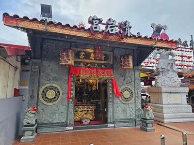 a building with a temple with a large doorway at Swettenham Room at Weld Quay Georgetown in George Town