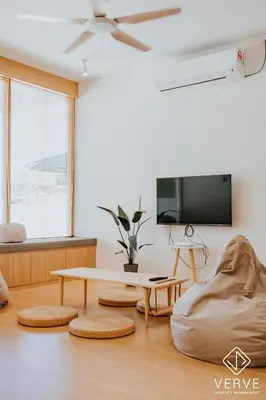 a living room with a coffee table and a tv at The Time Capsule 4B3B BY Verve 12 Pax in Ipoh
