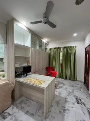 a room with a desk with a computer in it at KKB Gathering Home - ENTIRE HOME in Kuala Kubu Baharu