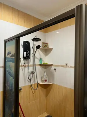 a bathroom with a shower with a shower curtain at KKB Gathering Home - ENTIRE HOME in Kuala Kubu Baharu