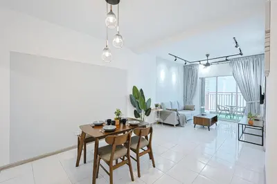 a white living room with a table and chairs at Modern Studio Retreat -Prime Location Brinchang Clover Home 1-03 in Brinchang