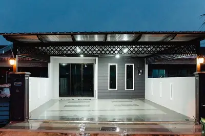 a metal pergola on top of a house at S&A Homestay in Sungai Petani