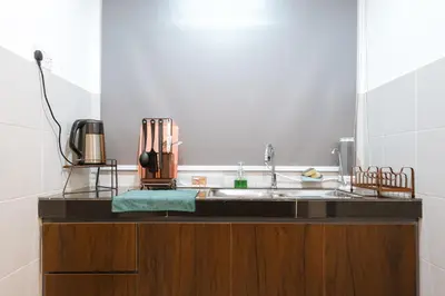 a kitchen with a sink and a counter top at Elegant Studio Escape at Emerald Avenue Brinchang Cameron Highland Clover Home 4-03 in Brinchang