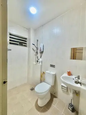 a bathroom with a toilet and a sink at H&Z Guesthouse Kulim Hi-Tech - Free Wifi - Netflix in Kulim