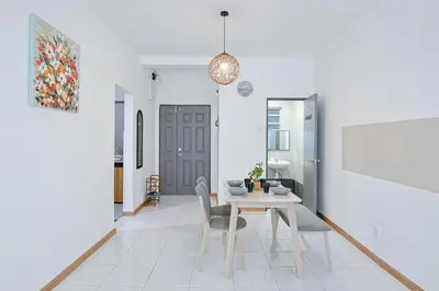 a dining room with a table and chairs at Clover Nest Cozy & Stylish Studio Retreat Brinchang - Clover Home 2-03 in Brinchang