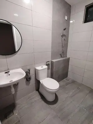 a bathroom with a toilet and a sink at D Banyan Homestay, Sungai Petani, EV Friendly Stay, FREE 22kW in Sungai Petani