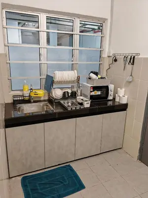 a kitchen with a sink and a counter top at ModernStyleW930WarmStay at Emerald Avenue Brinchang 3Room3Bath 2Parking in Brinchang