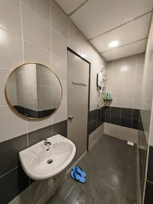 a bathroom with a sink and a mirror at ModernStyleW930WarmStay at Emerald Avenue Brinchang 3Room3Bath 2Parking in Brinchang