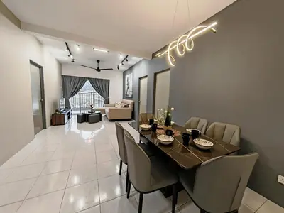 a dining room with a table and some chairs at ModernStyleW930WarmStay at Emerald Avenue Brinchang 3Room3Bath 2Parking in Brinchang