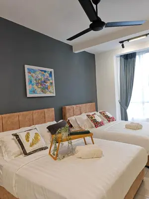 two beds sitting next to each other in a room at ModernStyleW930WarmStay at Emerald Avenue Brinchang 3Room3Bath 2Parking in Brinchang