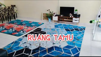 a living room with a runner tiled floor at Zunnurain Homestay in Kampong Batu Lapan