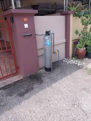 a fire hydrant in front of a building at Comfy21 Homestay Ipoh near Sunway Tambun in Ipoh