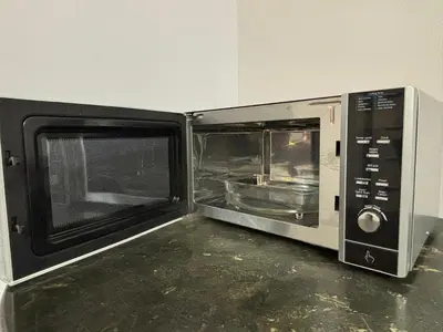 two microwaves are sitting next to each other at Comfy21 Homestay Ipoh in Ipoh