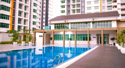 a swimming pool in front of a building at Classic Spot - Meru Raya in Ipoh