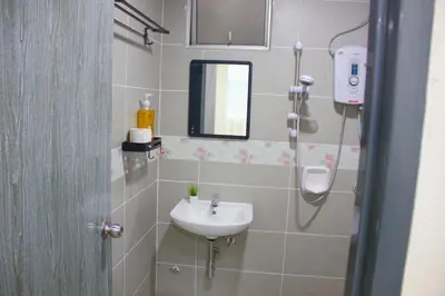 a bathroom with a sink and a shower at Classic Spot - Meru Raya in Ipoh