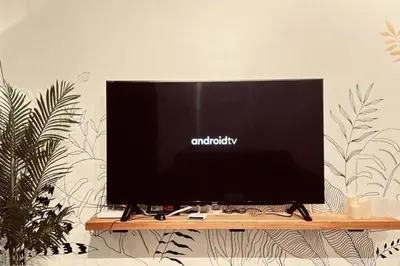 a flat screen tv sitting on top of a table at Single Terrace at Canning Ipoh Newly Renovated in Ipoh