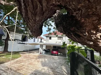 a house with a car parked in the driveway at New Island Luxe Retreat Vacation Home 14pax Nearby Gurney in Tanjung Bungah