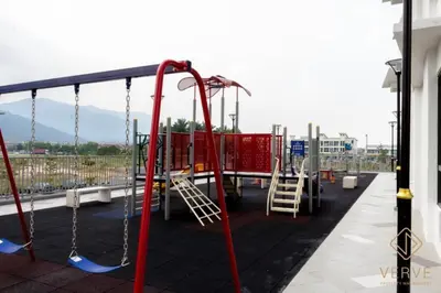 a playground with a swing set and a slide at Fusy Homestay Casa Kayangan Meru B2101 in Ipoh