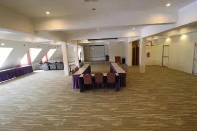 a large room with a long table and chairs at Iris House Hotel Cameron Highlands in Brinchang