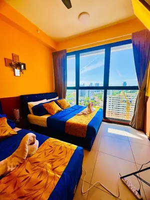 a bedroom with three beds and a large window at Deluxe Suite for10 Stunning Sea &City ViewsNetflix in Jelutong