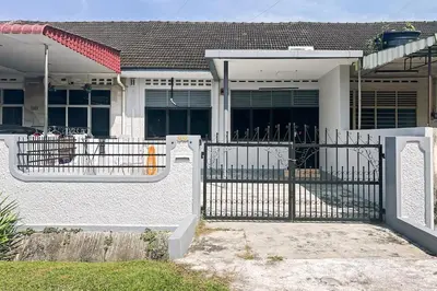 a white fence in front of a house at Homestay Taman Canning Ipoh, Perak - Smarthome in Ipoh