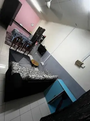 an overhead view of a living room with a couch and chair at Homestay Seri Aishah in Chemor
