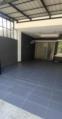 a large empty room with blue tiles on the floor at Chill Spot Homestay in Ipoh
