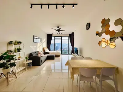 a living room with a table and a couch at 2BR Georgetown Luxury Suite #RooftopPool #Beacon in George Town